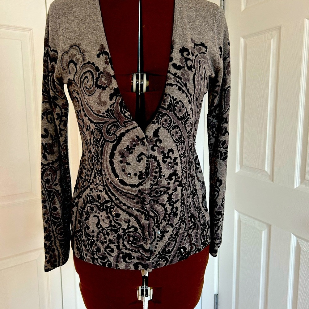 Deep V front, light weight paisley patterned sweater.
